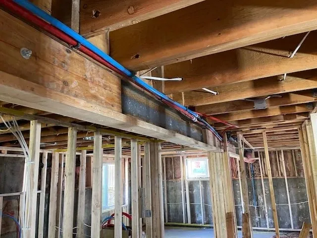 Piping within naked wall studs
