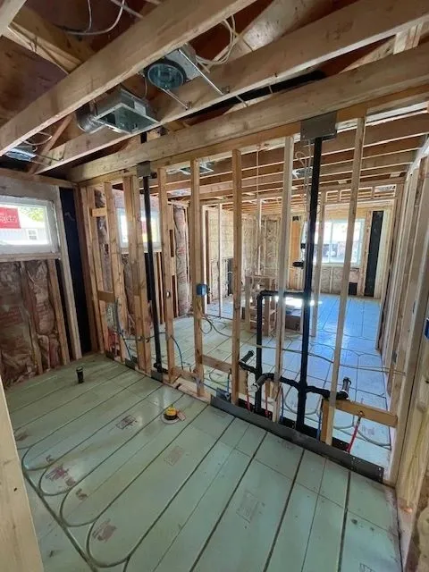 Piping within naked wall studs