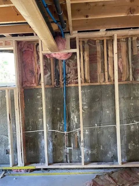 Piping within naked wall studs