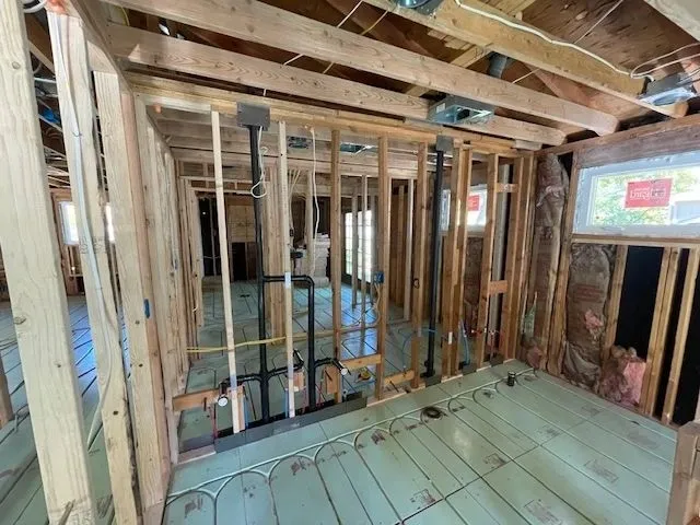 Piping within naked wall studs
